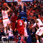 Syracuse guard Brandon Triche shoots against Louisville
