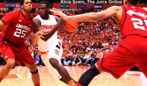 Syracuse guard Dion Waiters drives against Louisville
