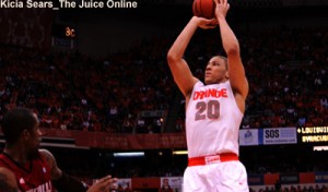 Syracuse guard Brandon Triche shoots against Louisville